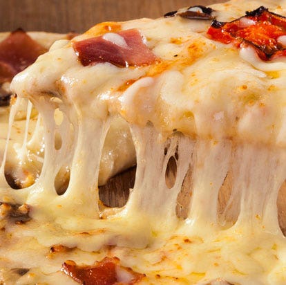 Melting cheese stretch, showcasing Ingredion dairy and plant-based dairy solutions