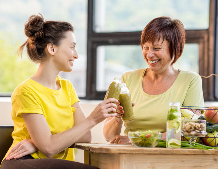 Two women with healthy smoothies